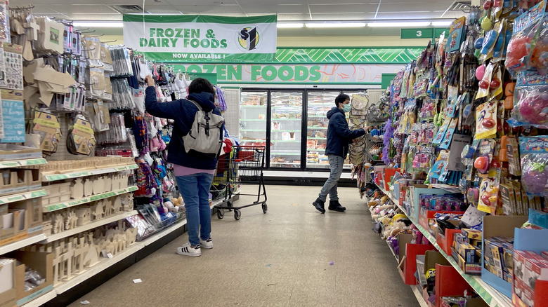 people shopping in dollar tree
