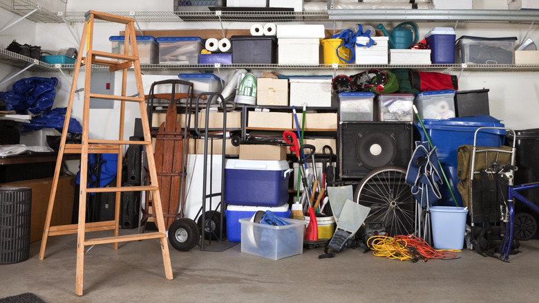 Messy garage wall with ladder