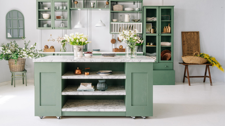 Kitchen with sage green cabinets