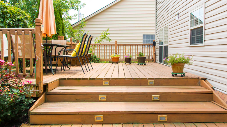 backyard wooden deck with seating