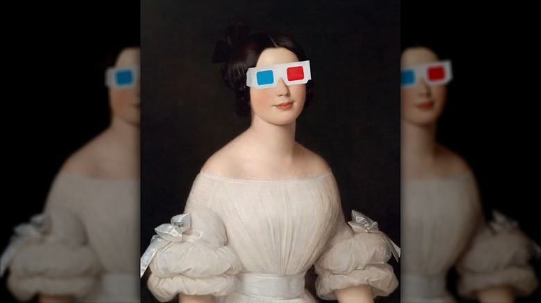 woman wearing 3D glasses
