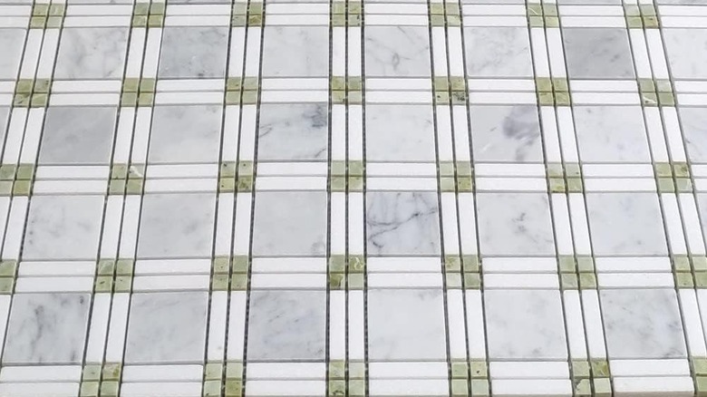 Plaid marble tiles with a jade green accent