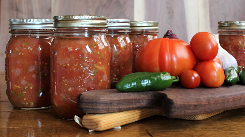 Salsa jars and vegetables