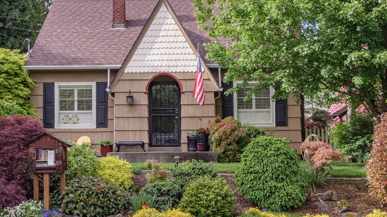 Plants surrounding house