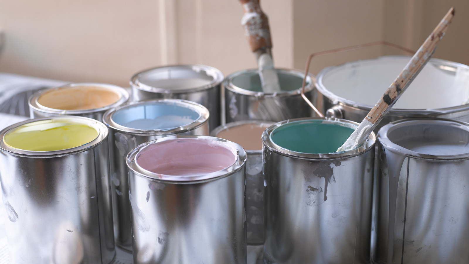 Poking Holes In Your Paint Can Is A Game Changer For Minimizing Mess