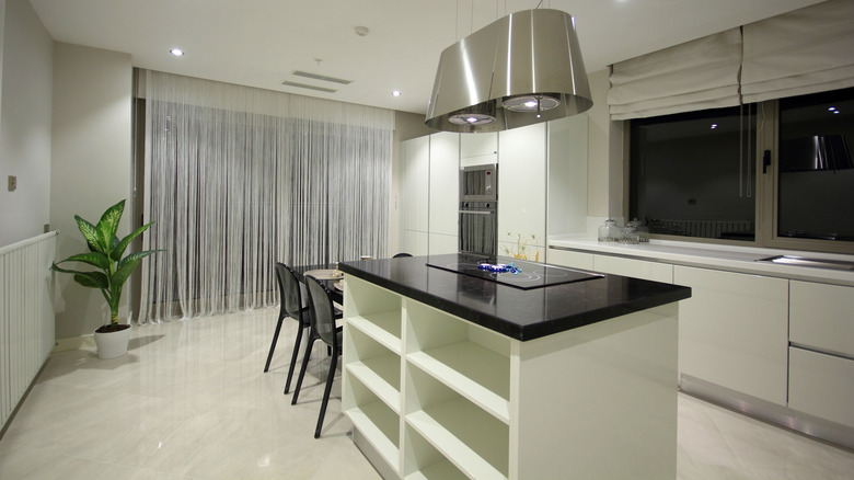 Living room with dark wood floors and warm colors