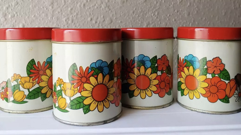 A retro canister set featuring a floral pattern