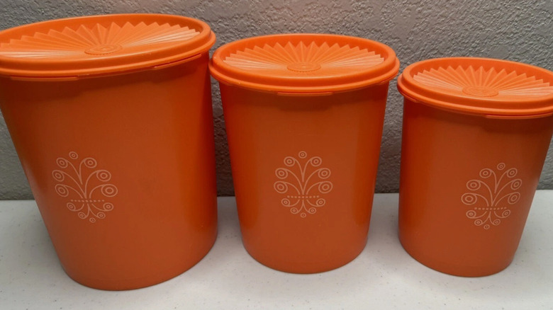 Vintage 1980s Tupperware canister set in orange