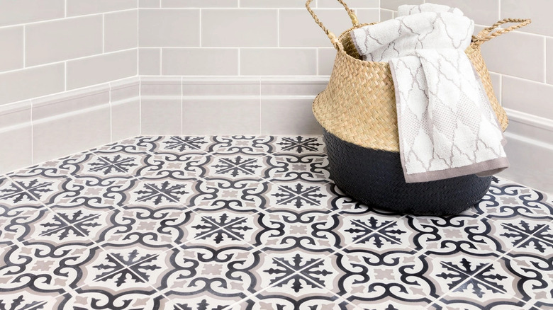 Encaustic patterned tiled bathroom floor