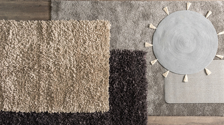 An overhead view of layered area rugs.