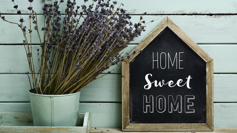 Close up of a chalkboard with text.