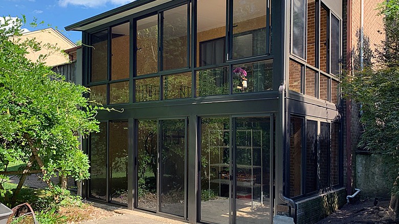Two story enclosed back porch of a home