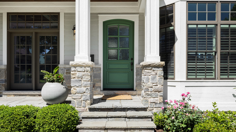 Stone flooring and pillars on a front porch