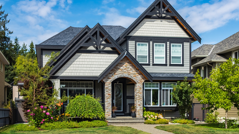 A house's front porch with architectural details like arch