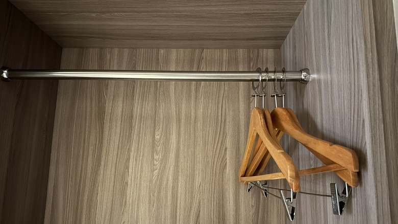 Stainless closet rod inside a cabinet