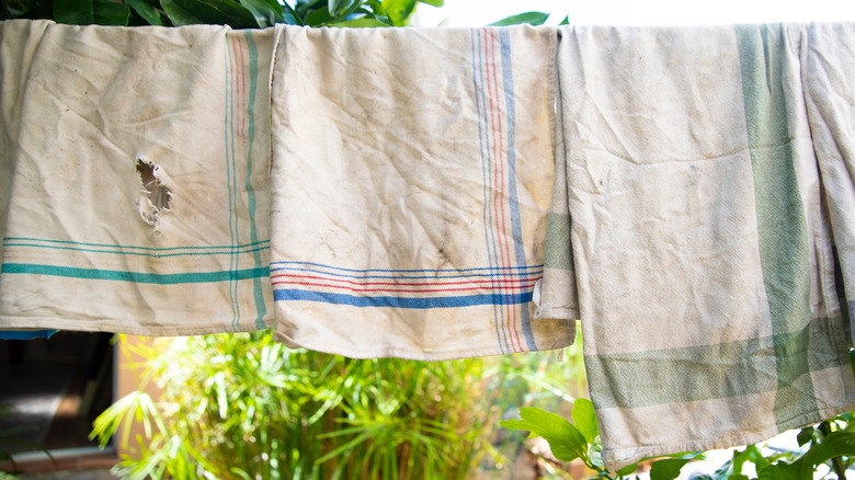 old towels hanging outside