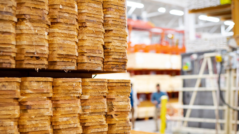 Panels of fences stacked in a hardwood store