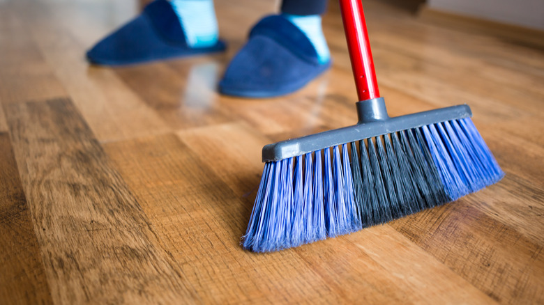 Sweeping hardwood floor