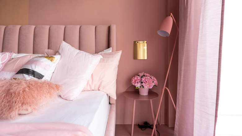 Pink bedroom and upholstered bed