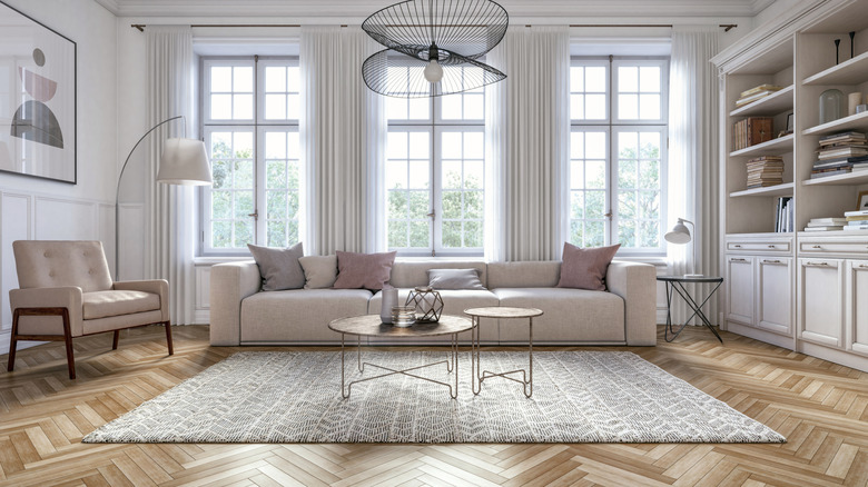 Bright living room with couch and chair