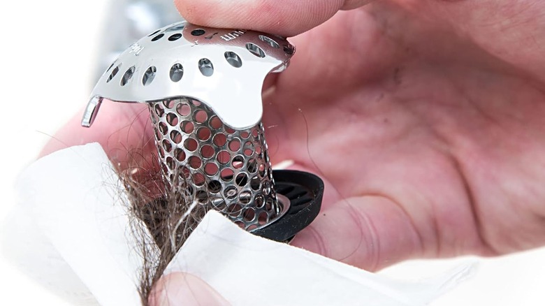 Removing hair from a stainless steel Tub Shroom