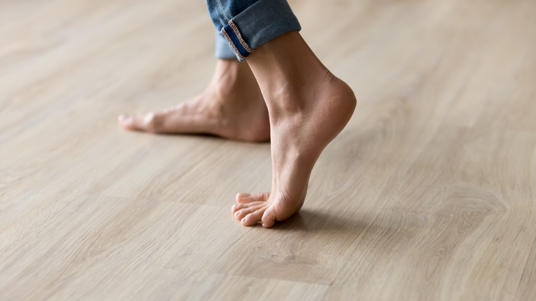 Bare feet on laminate flooring