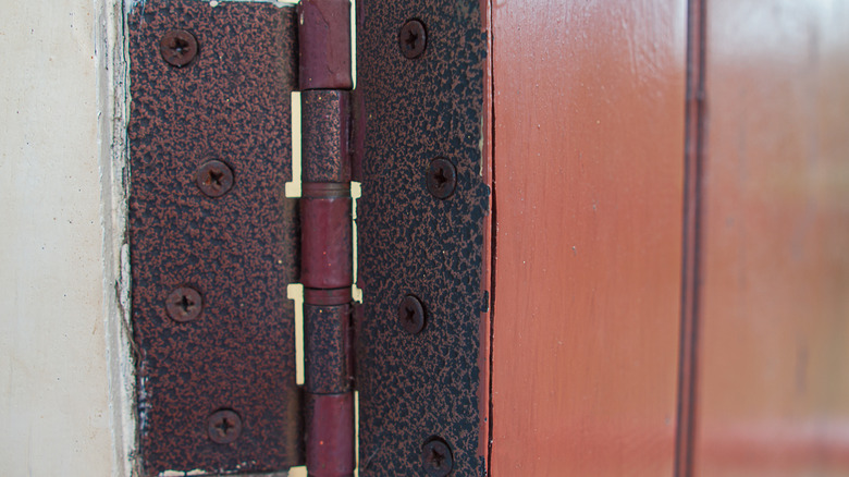 Rusty door hinge