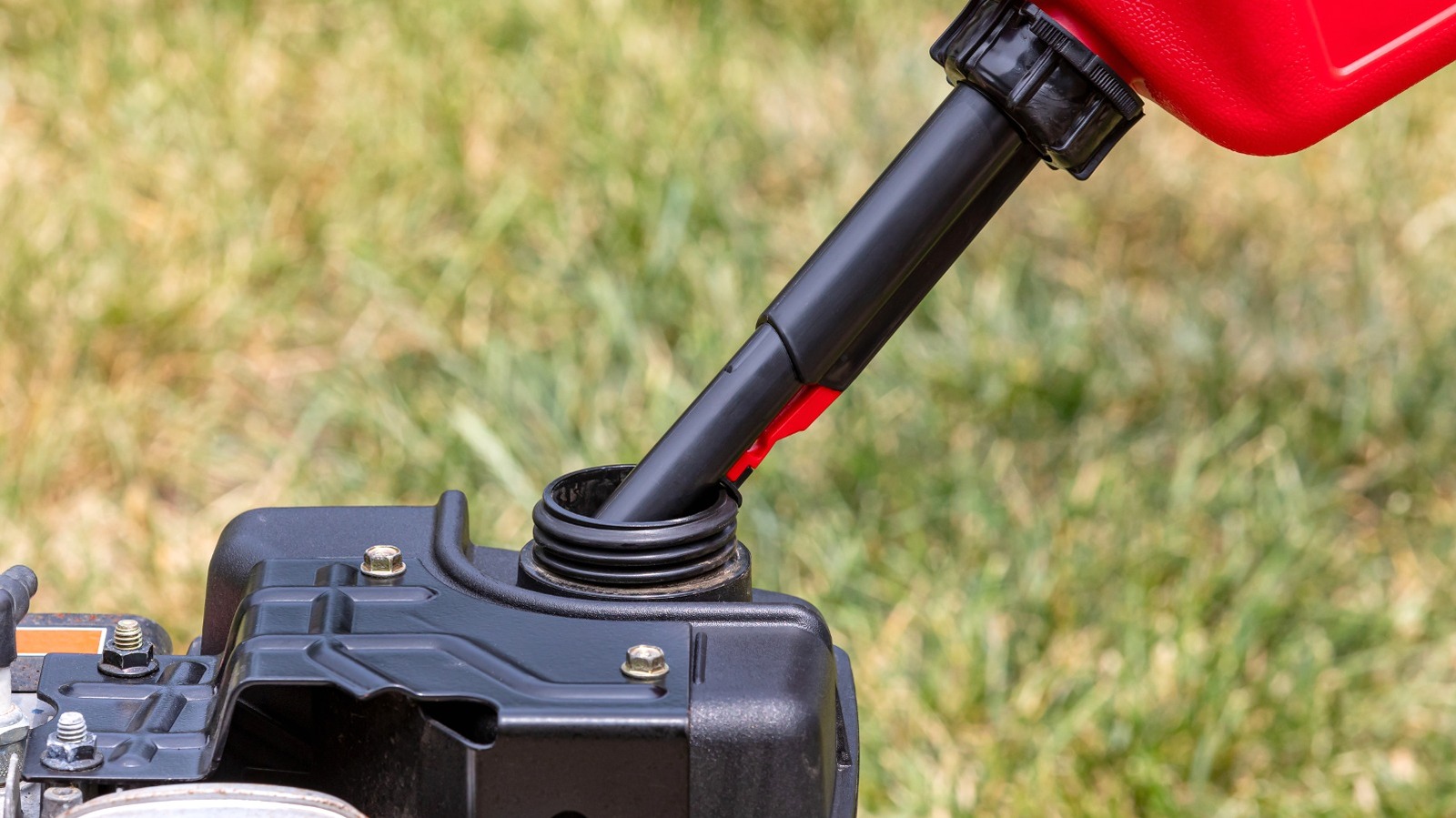 An Easy Way To Prevent Spills When Putting Gas In Your Lawn Mower