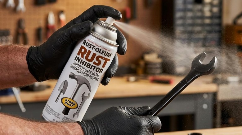 Rust-Oleum Stop Rust Corrosion Inhibitor Spray being used on a wrench