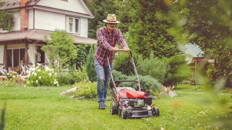 A man mowing the lawn
