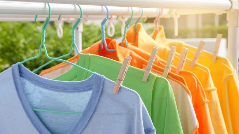 drying clothes outside with hangers