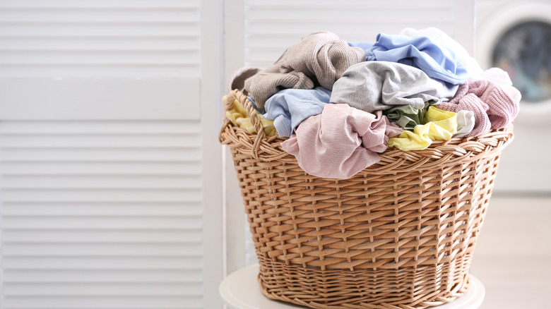 dirty laundry in a wicker basket