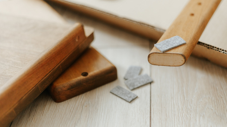 Furniture pads on wood
