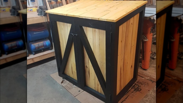 DIY outdoor bin enclosure made of wood
