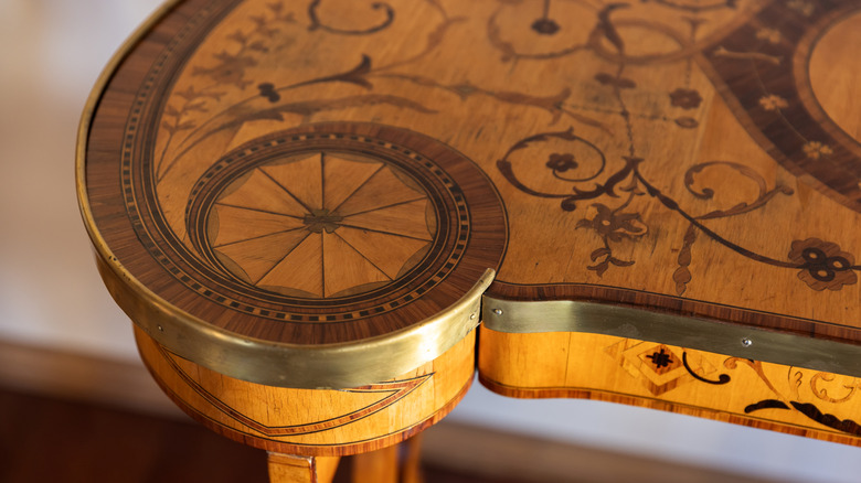 A table with a wood inlay