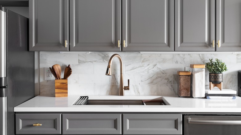 White countertops with gray cabinets