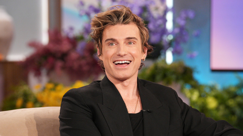 Jeremiah Brent smiling on a talk show