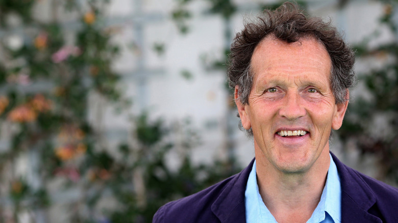 Monty Don smiling happily with plants in the background