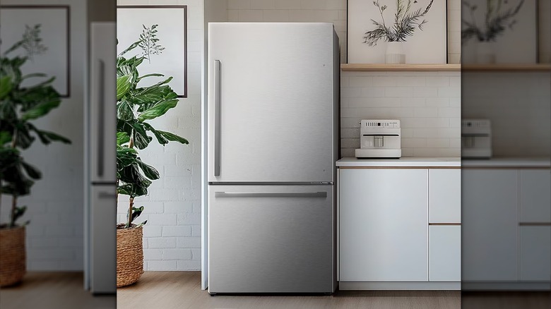 White Hisense fridge and freezer in minimalist white kitchen