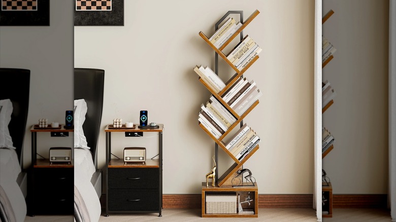 A small wooden bookshelf sits next to a nightstand