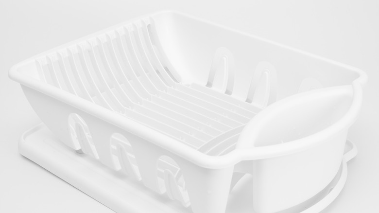 White Dollar Tree Essentials Plastic Dish Drying Rack are shown in a detail shot