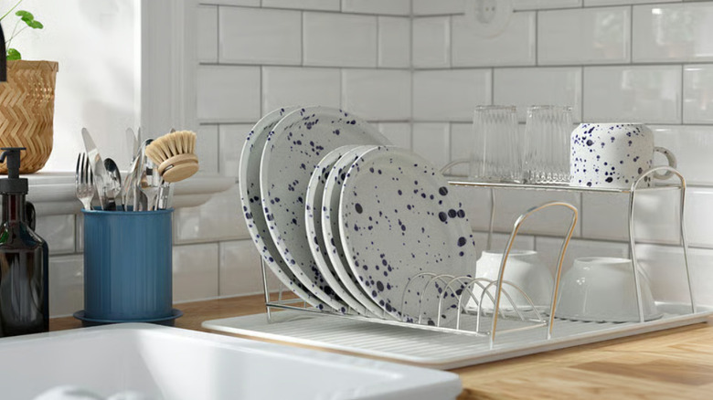 Various IKEA dish drying solutions with wire dish rack beside sink
