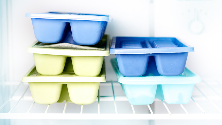 five iice trays in freezer