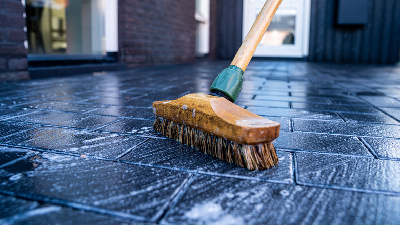 scrubbing a concrete floor