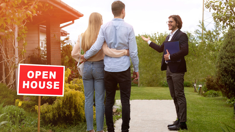 happy couple at an open house