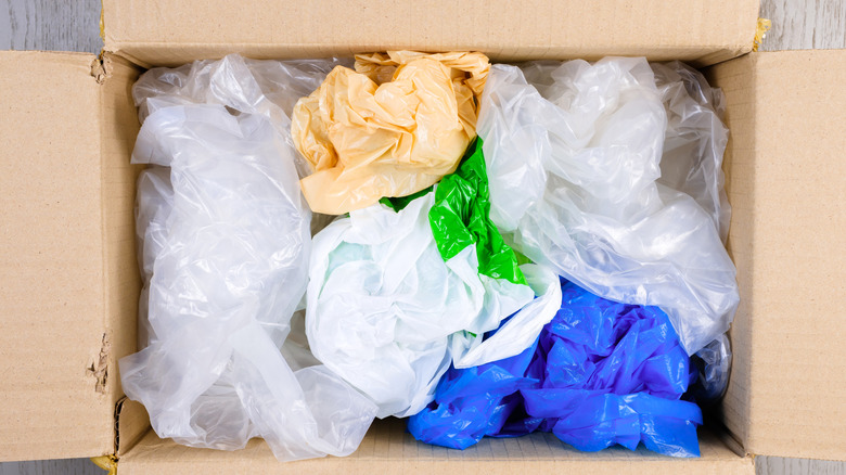 A collection of plastic bags in a box
