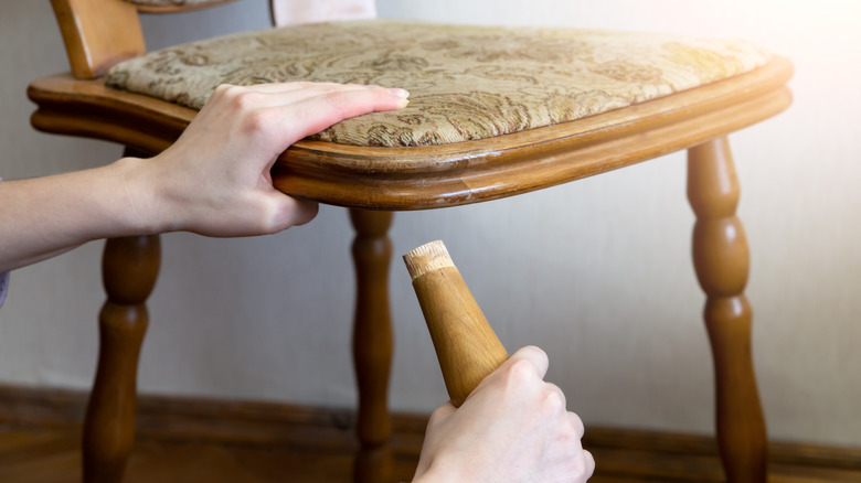 Wooden dining chair with the leg off