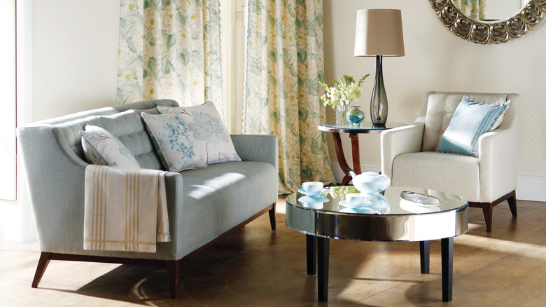 Living room with light blue and white home decor