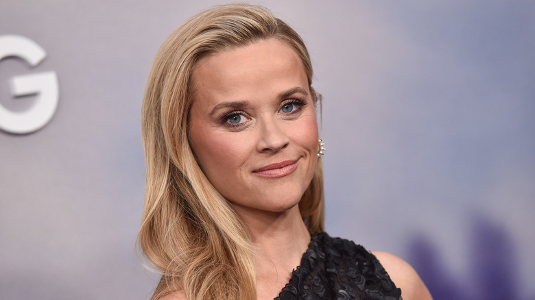 Reese Witherspoon posing for a picture while smiling slightly