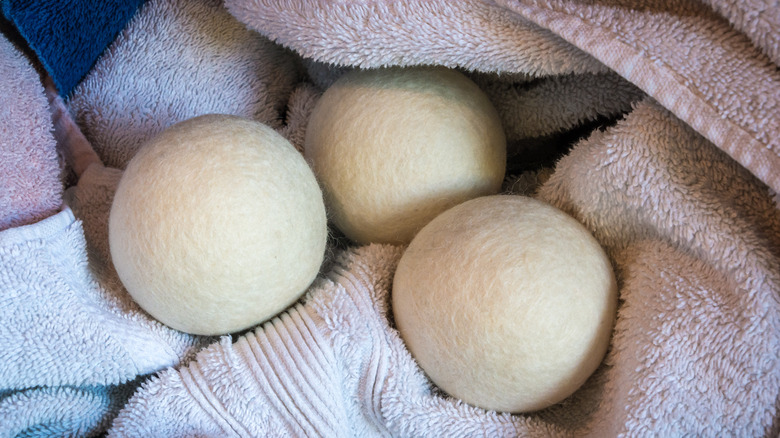wool dryer balls on towels 